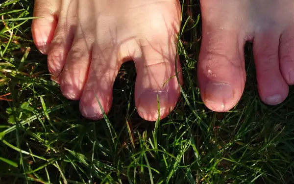 Loving the feel of wet grass 👣.